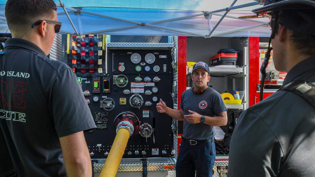 Hilton Head Island Fire Rescue Capt. Bryan Scharver explains the new pressurization controls for the custom designed KME pumper truck during training on Aug. 1, 2024 at headquarters on Hilton Head.