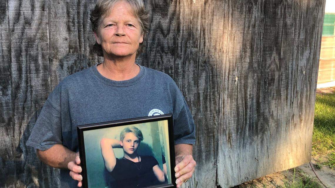 Sandy Smith holds a photo of her late son, 19-year-old Stephen Smith, on June 24, 2021. “There will never be another one like him,” she said.  