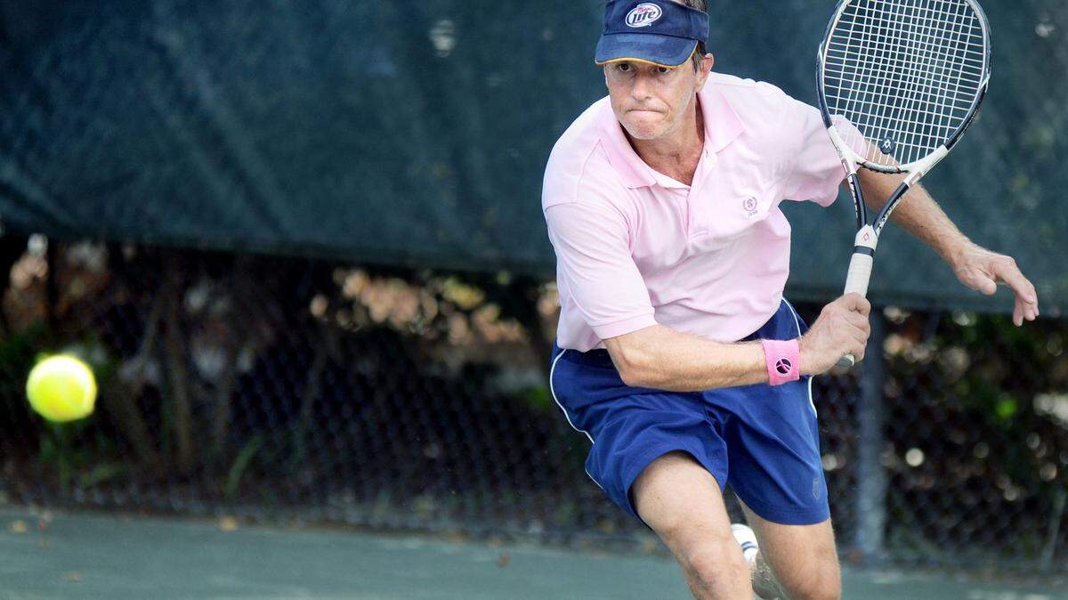 Hilton Head Islandâ™s Mark White charges the ball during his Men's 3.5 Singles final during the Banana Open Championships tennis tournament last year in Palmetto Dunes.