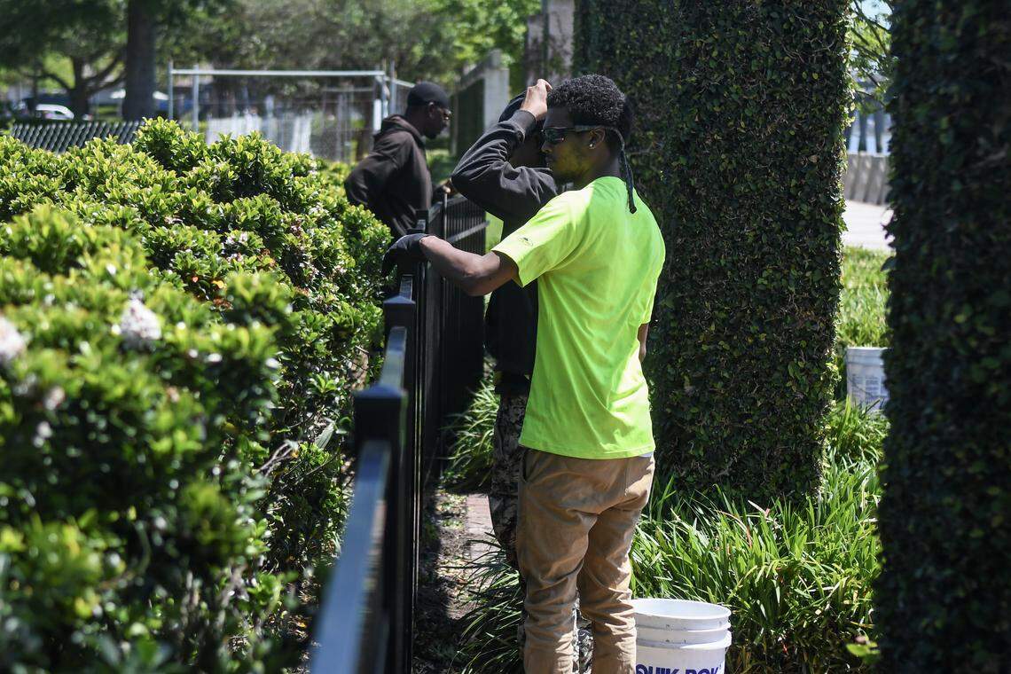 Workers with Graybar Fence Company install new aluminum fencing to replace the chainlink fencing on April 15, 2026, at Henry C. Chambers Waterfront Park in downtown Beaufort. The better-looking fencing keeps pedestrians from walking the promenade due to structural problems of the relieving platform.