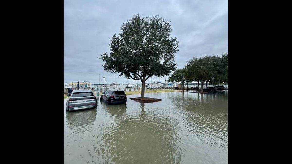 Water from the Beaufort River floods the parking area at Beaufort’s Waterfront Park Friday, the result of a particularly powerful high tide.