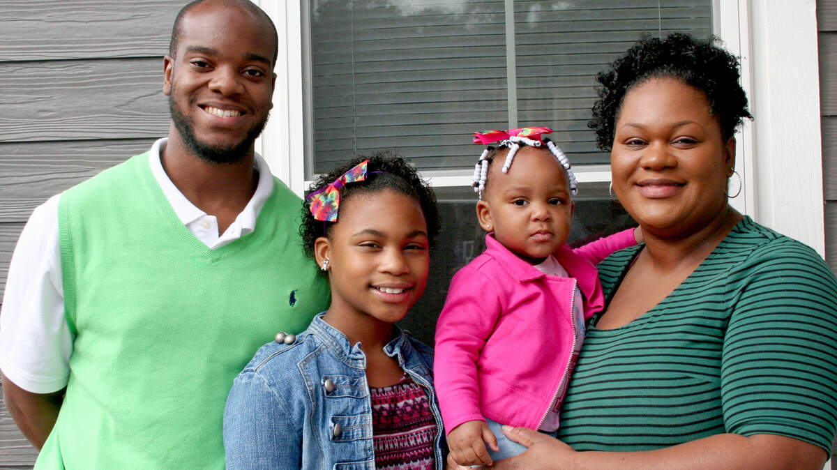 The Greene Family, Tevin Greene, from left, Kailey Pusha-Weeks, Taylor Greene and Lakicia Pusha, will receive a newly-built home in Mint Farm on Dec. 19, 2015, the Lowcountry Habitat for Humanity?s third and final home built for the year.