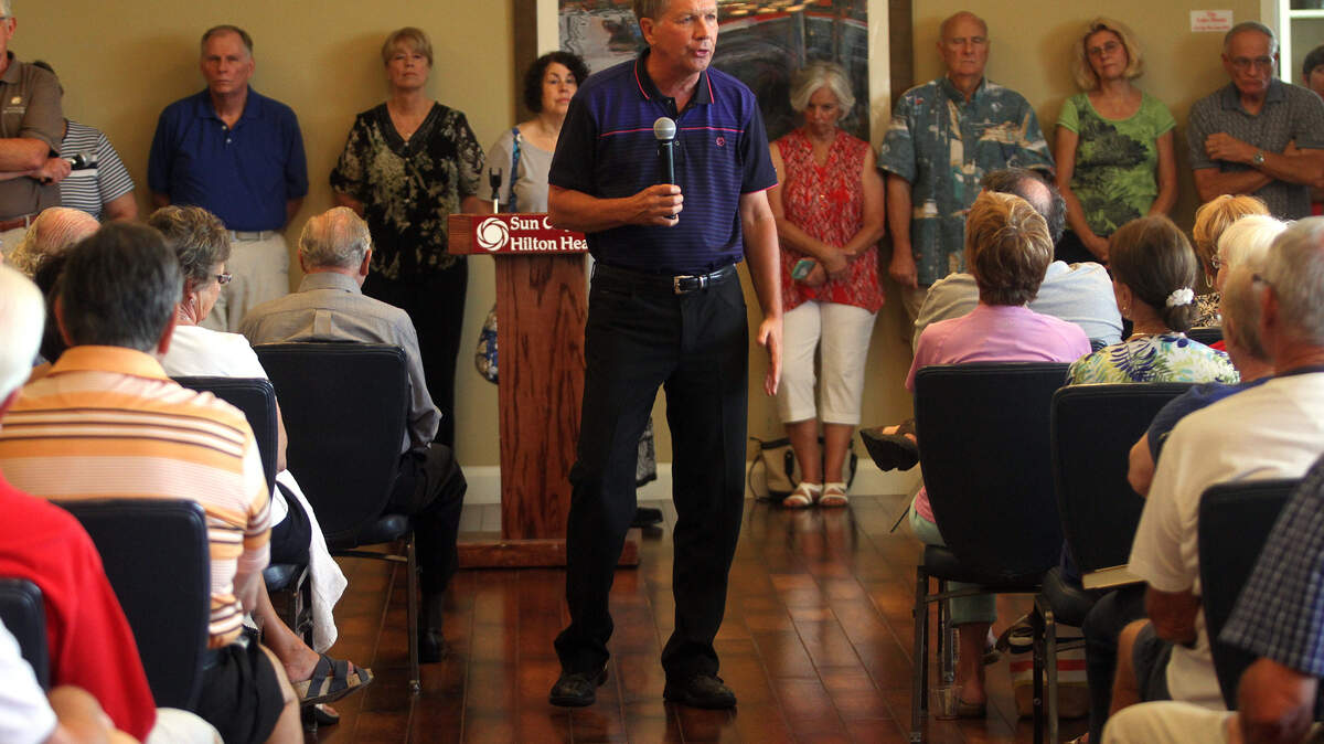 Ohio Gov. John Kasich speaks to Sun City residents during the event hosted by the Republicans of Sun City Hilton Head on Wednesday afternoon at the Lakehouse Ballroom in Sun City Hilton Head.