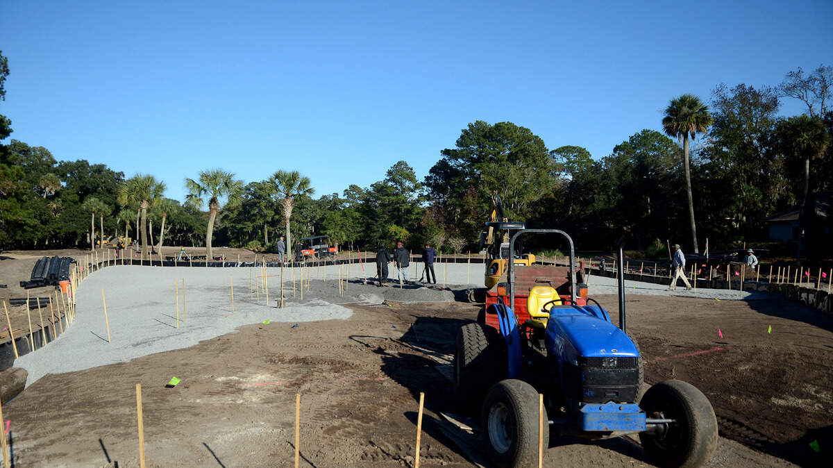Workers with MacCurrach Golf Construction Inc. build the green profile on the second hole of the Ocean Course on Dec. 4 in Sea Pines Resort on Hilton Head Island.