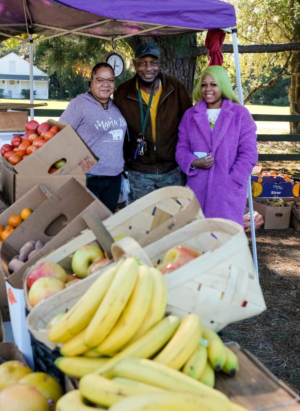 Carrie Campbell, from left, her husband Wesley Campbell and their daughter Haley Campbell pose for a photo at Hilton Head Farmers Market on Tuesday, Nov. 17, 2020 on the grounds of Coastal Discovery Museum on Hilton Head Island. Carolina Seafood & Produce, their family-owned business and a daily fixture at Squire Pope Road and U.S. 278, had to pack up after the town of Hilton Head Island purchased the land in August. “Our regular customers were very disappointed.” Carrie Campbell said when asked about the move.