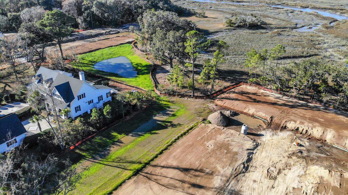 This home along the marshes of Jarvis Creek along Jonesville Road, with clear cut land on both sides as seen on Friday, Jan. 6, 2023, will be sandwiched between a new housing development currently under construction on Hilton Head Island.