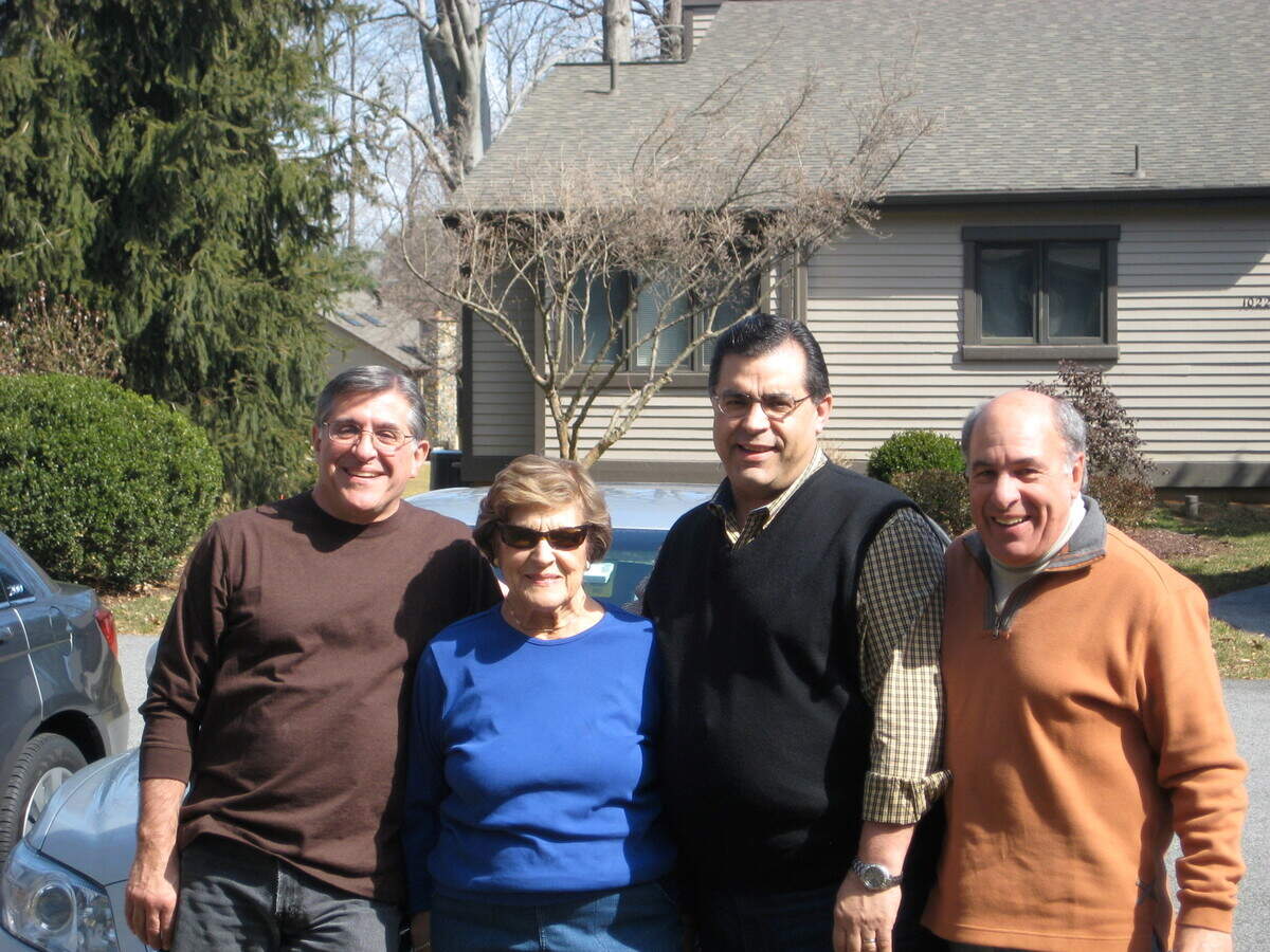Olympia Bafundo and her three sons before the COVID-19 pandemic.