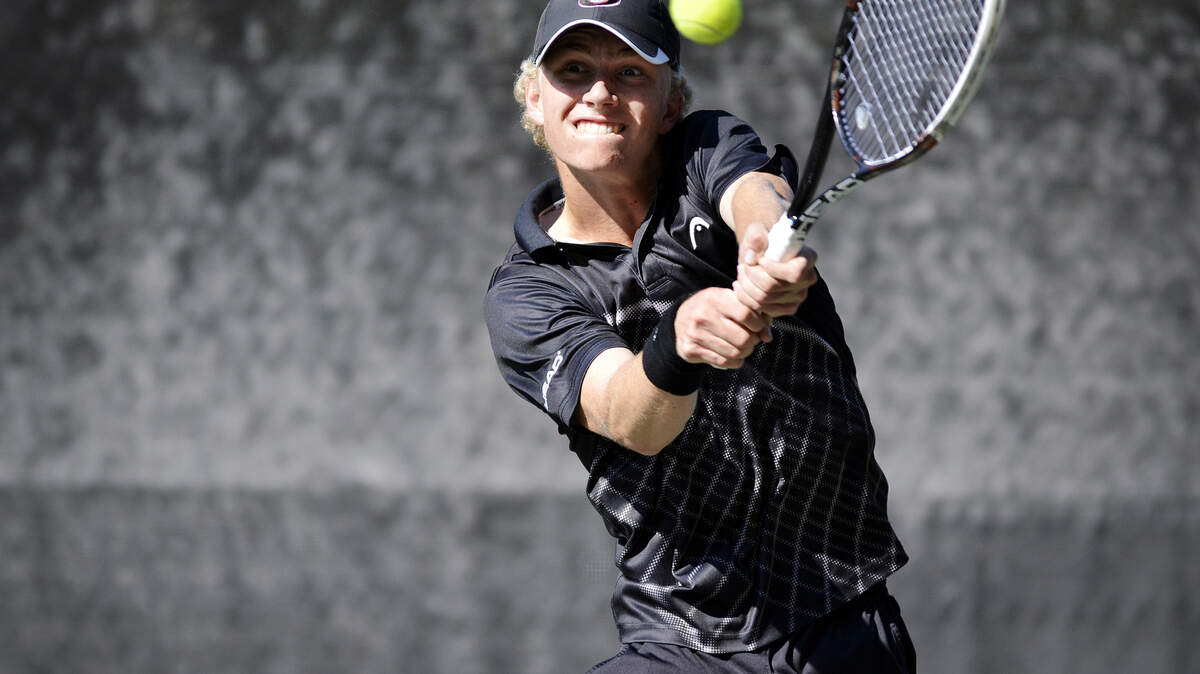 No. 5 Walker Duncan, returns a serve on his backhand against No. 17 Jess Jones, not pictured, during the USTA Van Der Meer Southern Winter Closed tournament on Hilton Head Island at the Van Der Meer Shipyard Tennis Resort  on January 21, 2014.