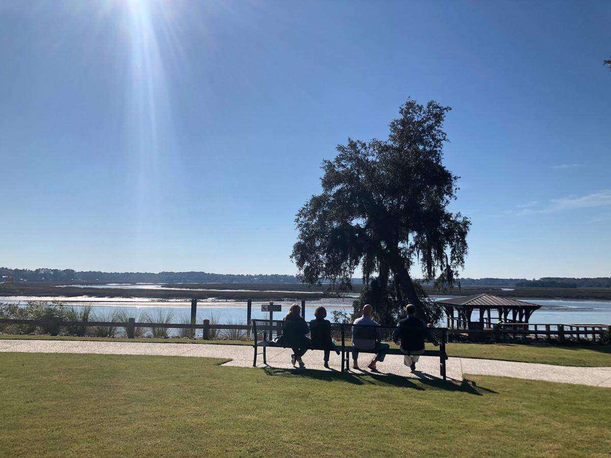 A group of people take in the views of the May River at the new Wright Family Park in Old Town Bluffton.