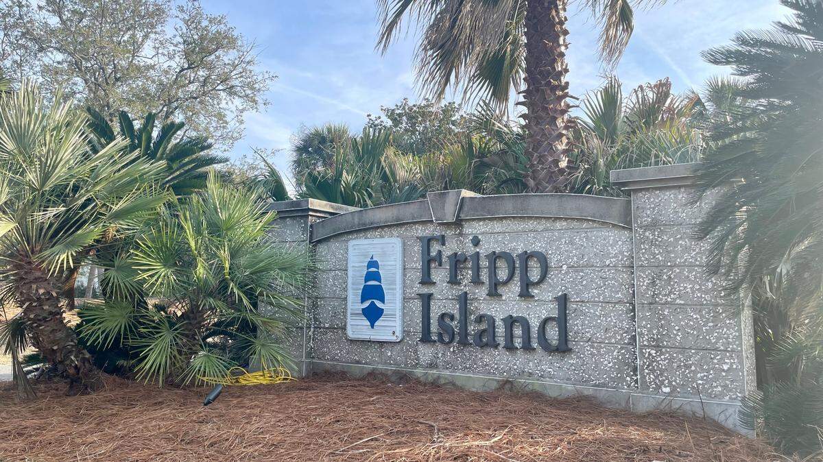 To get onto Fripp Island, residents or visitors drive over a bridge from St. Helena Island, pass this sign and a gate house.