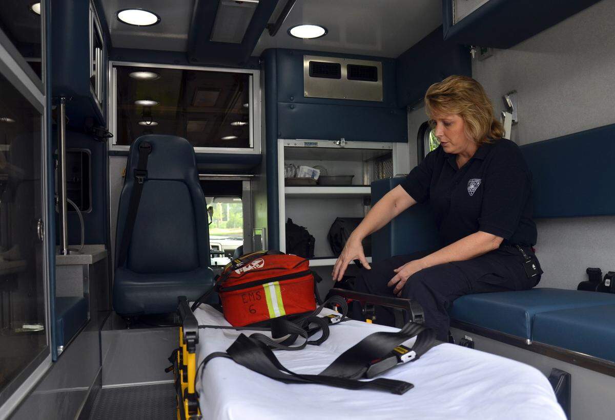 In this file photo from 2013, paramedic and training officer Julie Williams goes over the features of a newly renovated ambulance at Beaufort County EMS headquarters on Depot Road in Beaufort.