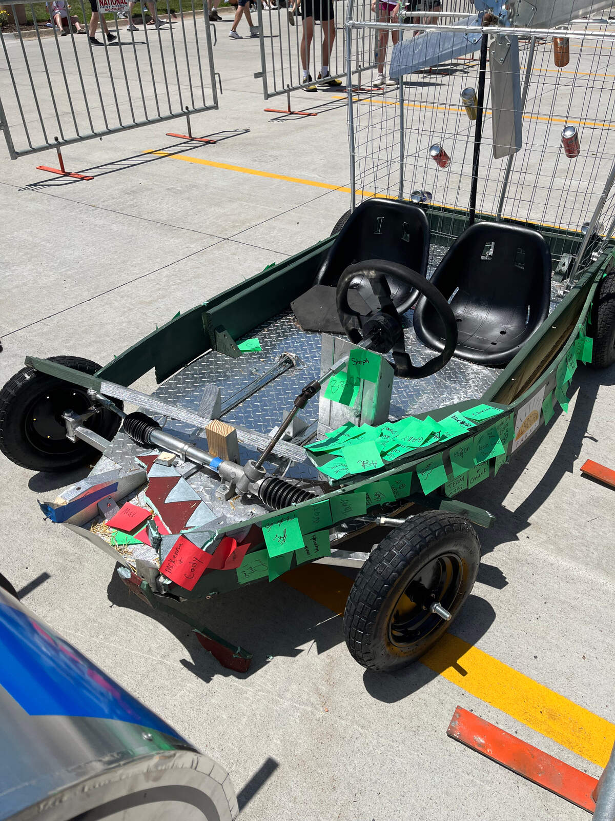 The adult-sized soapbox car “Gator Bait” after it finished the Red Bull race in Iowa had the front of the car ripped apart after the team used the one-time braking system to stop at the finish line.