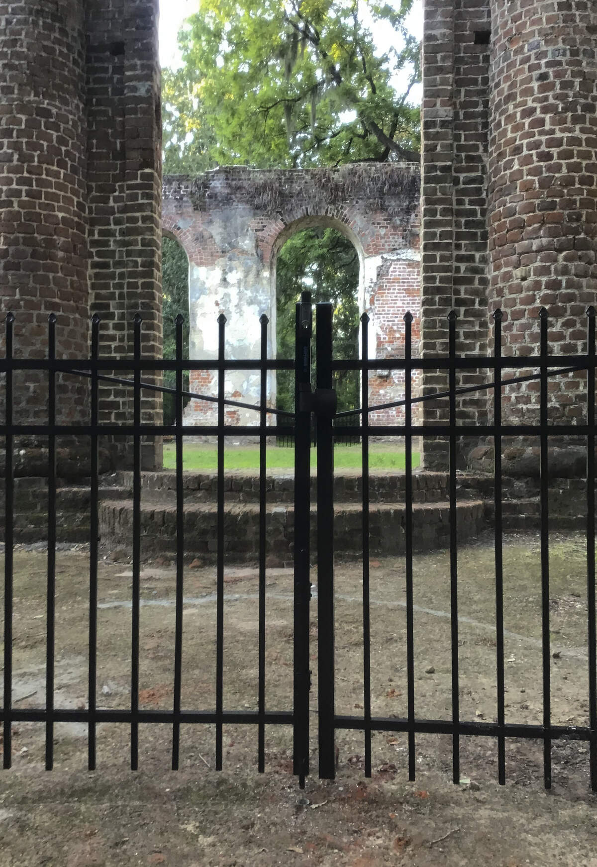 A locked gate now greets visitors to Old Sheldon Church ruins after a fence was built around the property to help prevent vandalism.