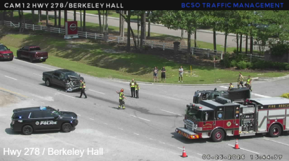 Authorities shut down both eastbound lanes of U.S. Highway 278 after a collision caused a pickup truck to overturn outside the Vaden Nissan Hilton Head dealership in Bluffton.