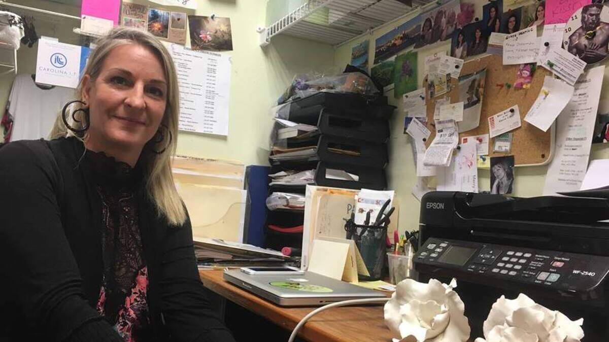 Sonia Landwehr Hunt sits in her office at Taffeta, a long-time Hilton Head store opened by her mother Gianna Landwehr in 1989. The store is closing after 29 years.