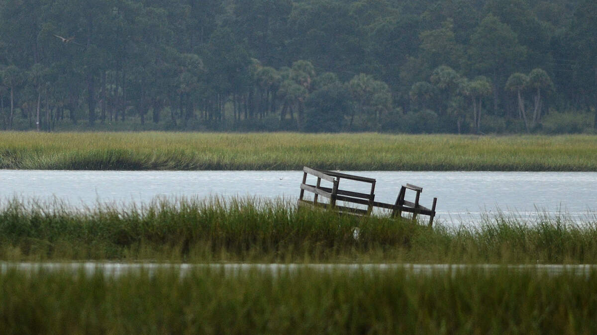 An abandoned dock sits on a sandbar in the May River on Sept. 28, 2015, in Bluffton.