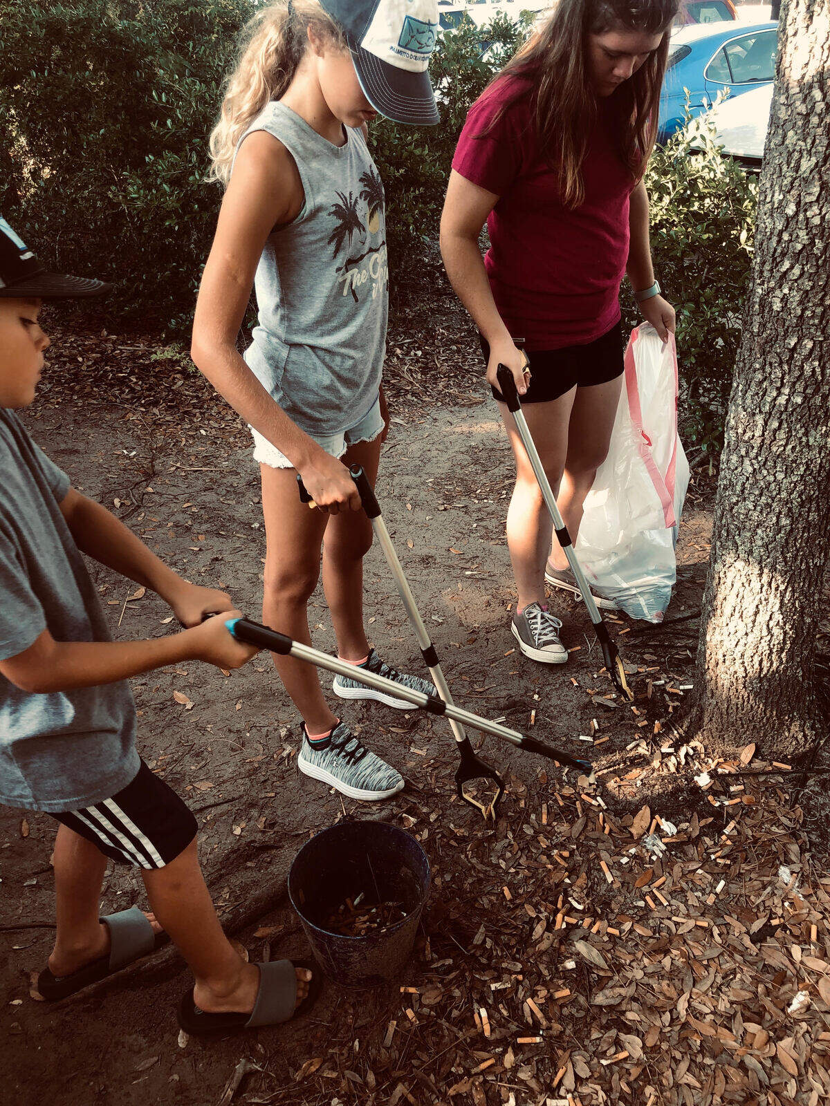 Volunteers help clean up cigarettes in the Coligny Beach Park area. Michelle Meissen photo