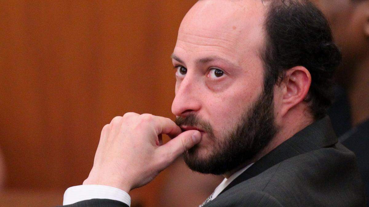 Mark Schnee listens to testimony during the trial of Lorenzo Young and Trenton Barnes for the 2013 murder of Kelly Hunnewell. Schnee represents Young. 11/13/2014