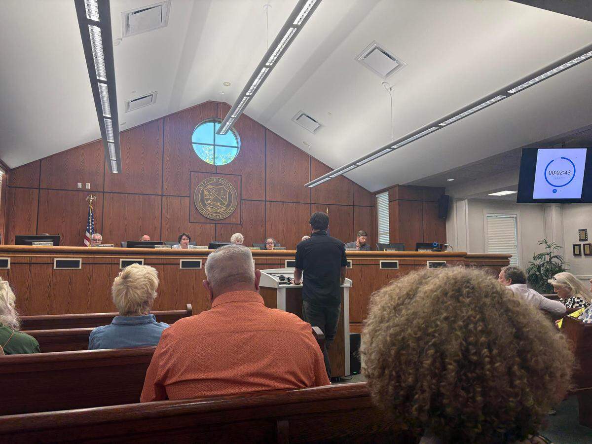 Developer Elvio Tropeano speaks during the public comment period at the April 14 county council meeting. Earlier this month, he submitted a new plan to remove his property from the cultural protection overlay.
