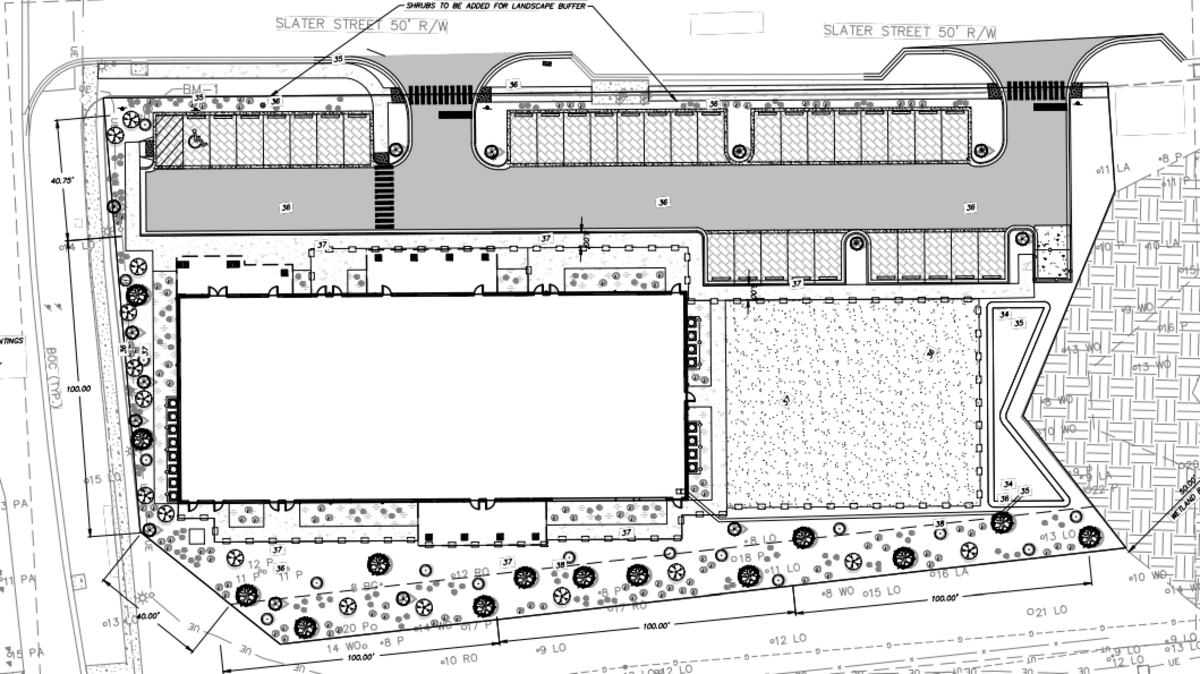 The proposed site plans show entrance to the site off of Slater St., an 11,000 square foot facility and outdoor play area.