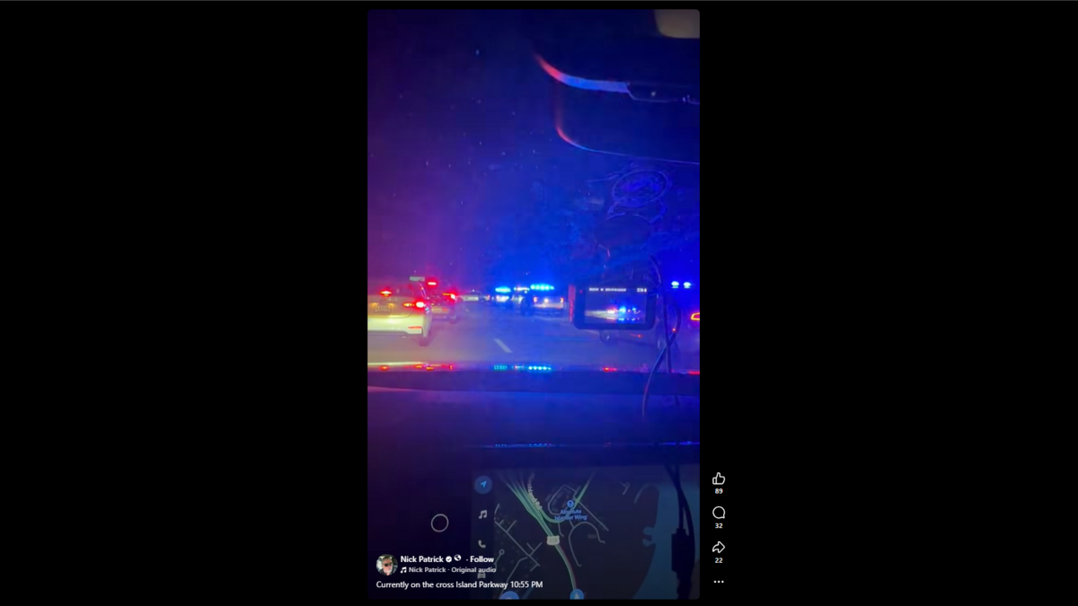 A screenshot of a video posted to Facebook shows police cars stopped at Cross Island Parkway.