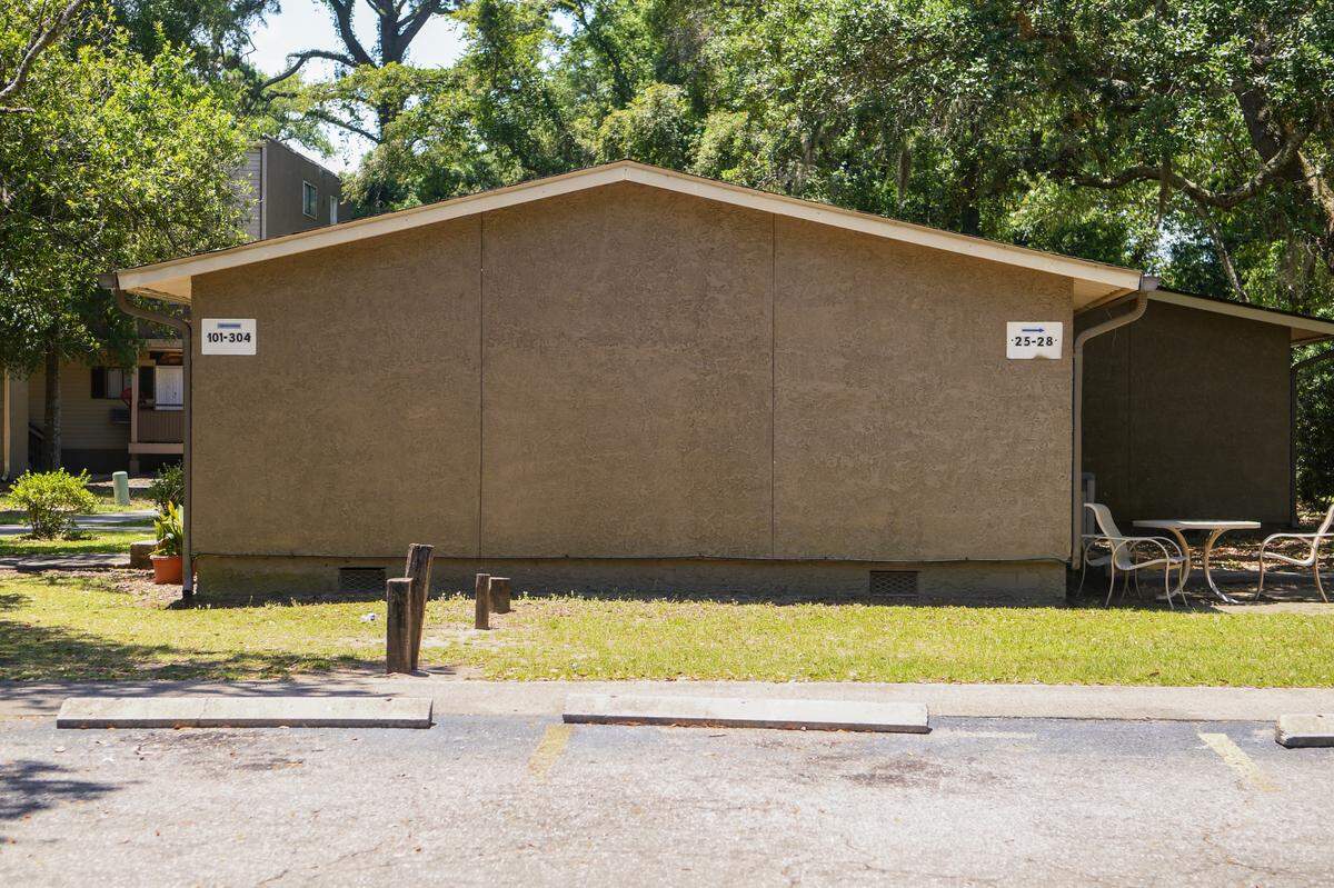 A building within Chimney Cove Apartments serves as a direction finder for apartments within the complex as seen on May 25, 2023 on Hilton Head Island. The owner of the property has submitted plans to raise the current buildings and build luxury apartments