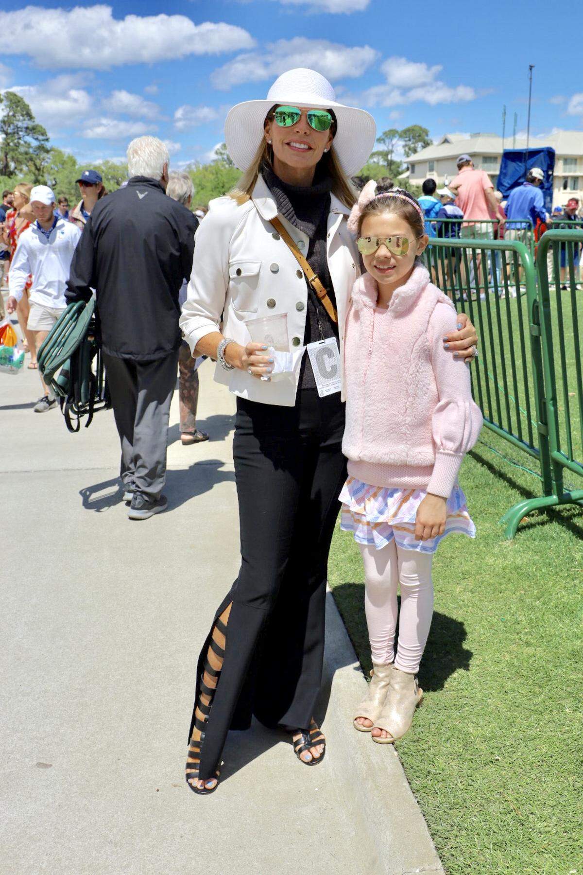 Mary and Lilly Bach make an adorable, classic mommy-daughter duo as both outfits looked stylish and comfortable. Both were well dressed for the cooler weather and say their outfits today are the warmest pieces they packed. Being classy never goes out of style and these two ladies wore their outfits so well.