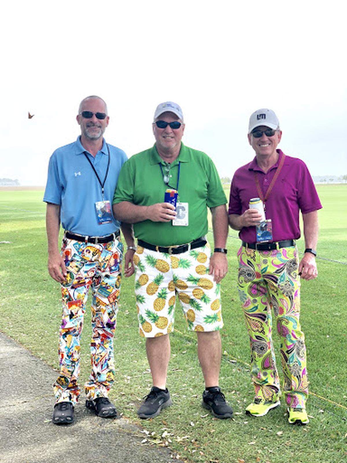 When the conversation starts with: “It all started with a bet and they’ve been doing it ever since” you know it’s a good story. Dave, Rodney and Steve have been making colorfully-matching statements each year at Heritage since 2010. The first year, they wore golf-balls and hot dogs. This year, we see postcards, pineapples and paisley. Dave (left) and Rodney (m) are both from Savannah while Steve (right) visits from London. Every year, these three gentlemen make the effort to stand out and utilize the brightest colors they can find.