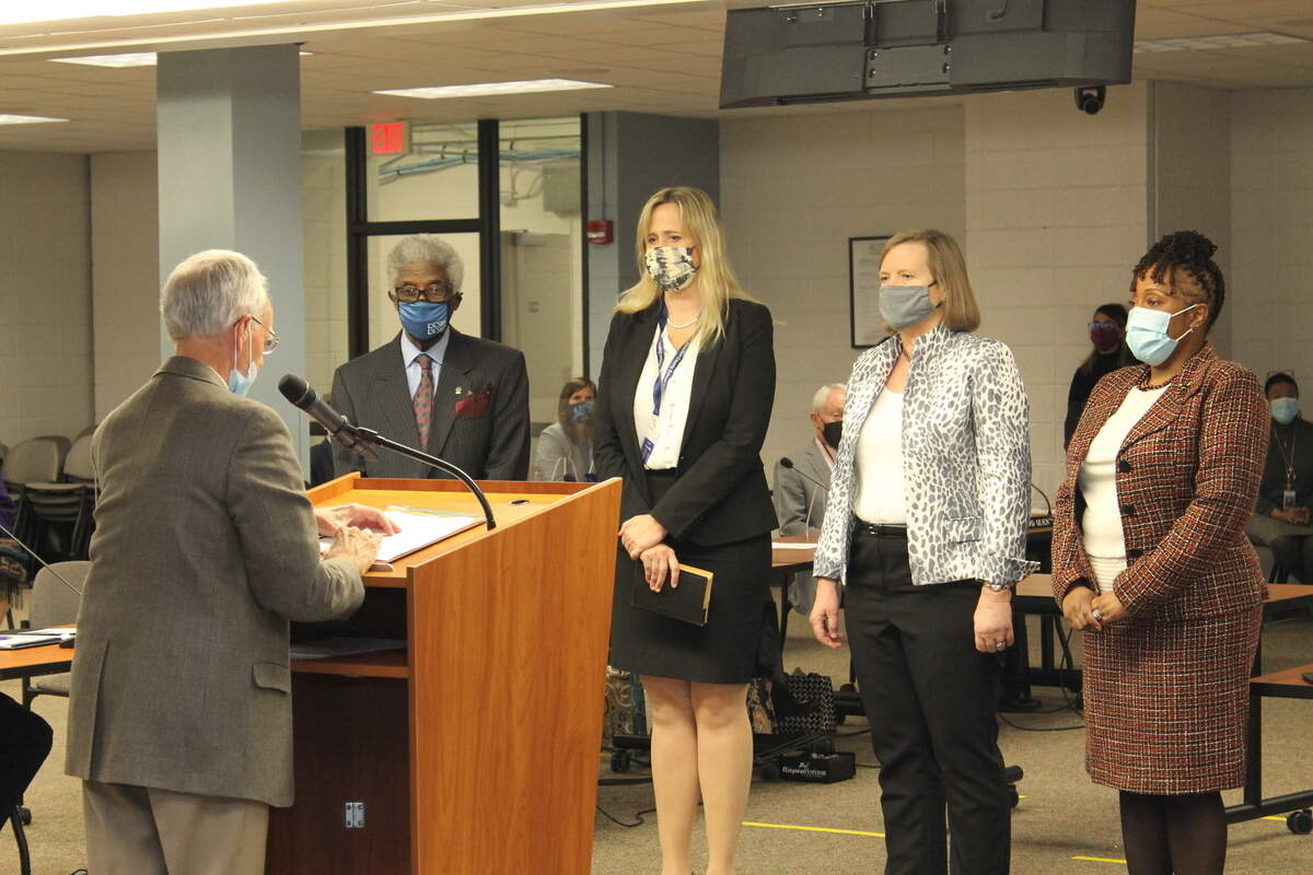 Judge James Grimsley III swore in new and returning board members at the Beaufort County Board of Education’s Jan. 5 meeting. Those members include (left to right) Earl Campbell, Ingrid Boatright, Christina Gwozdz and Angela Middleton.