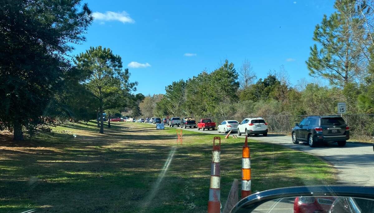 Cars line up to dump trash and recycling off at the Bluffton convenience center.