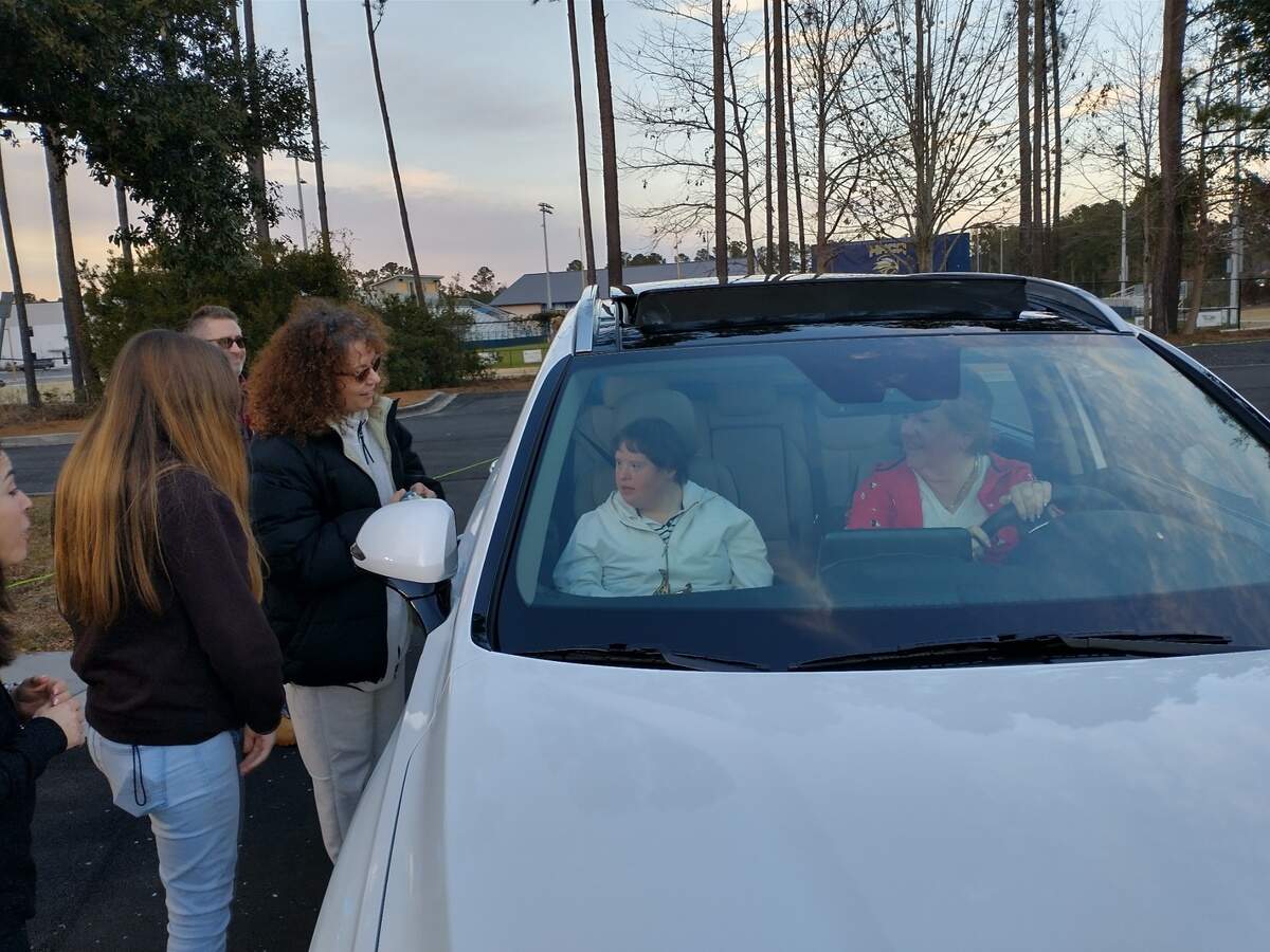 Courtney Kawchak, 26, was honored at the annual Night to Shine event’s drive-thru parade Friday.
