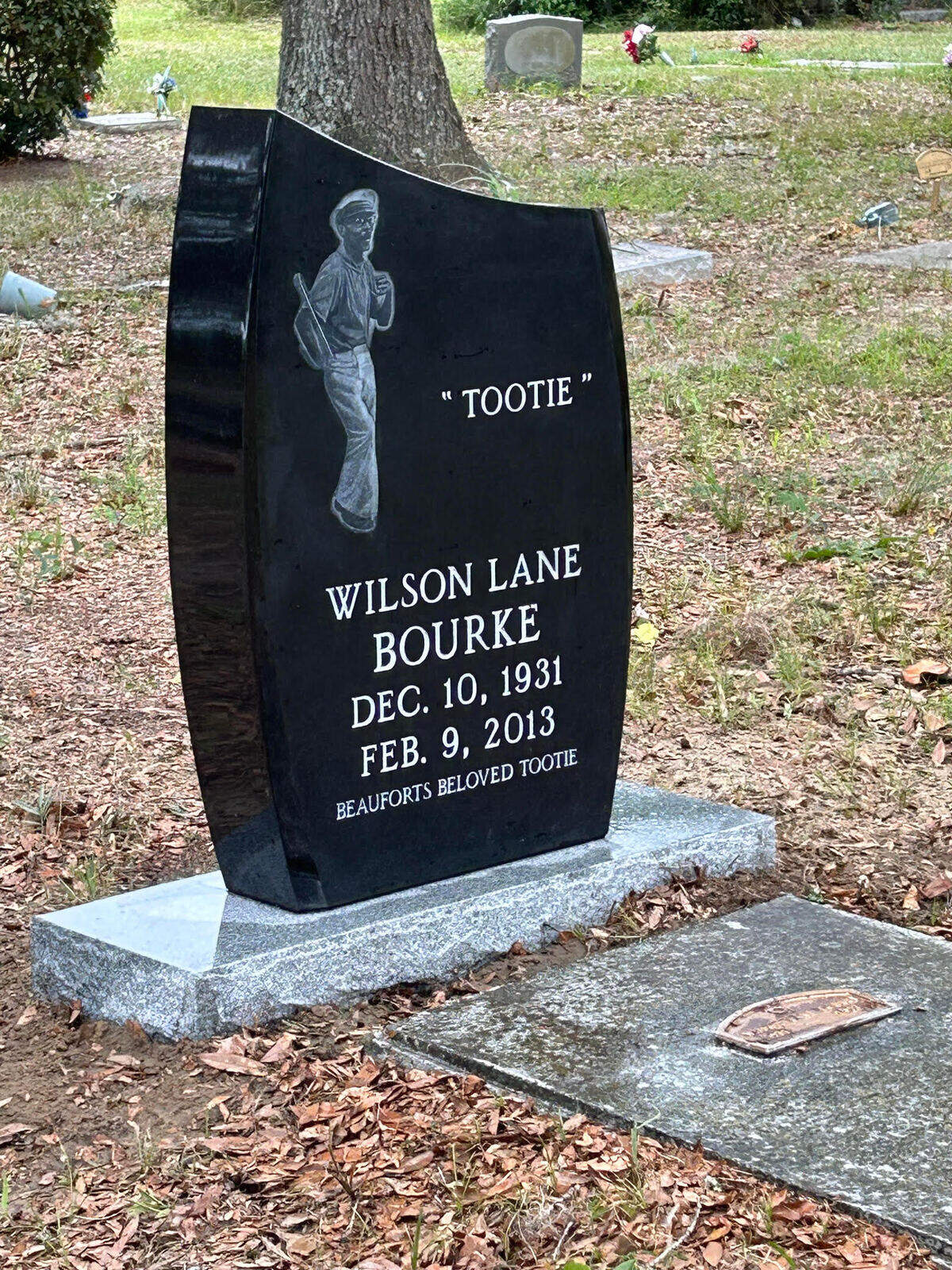 A headstone now marks the final resting spot of Wilson Lane “Tootie” Bourke.