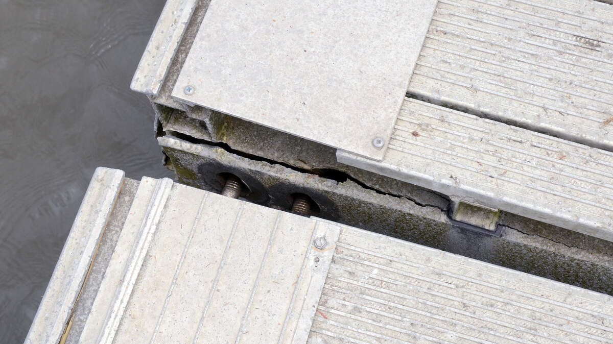 Sections of the floating dock at the Pigeon Point Landing in Beaufort -- photographed Aug. 6, 2015, -- have come apart and the metal has cracked, forcing the closure of the landing until repairs can be effected.