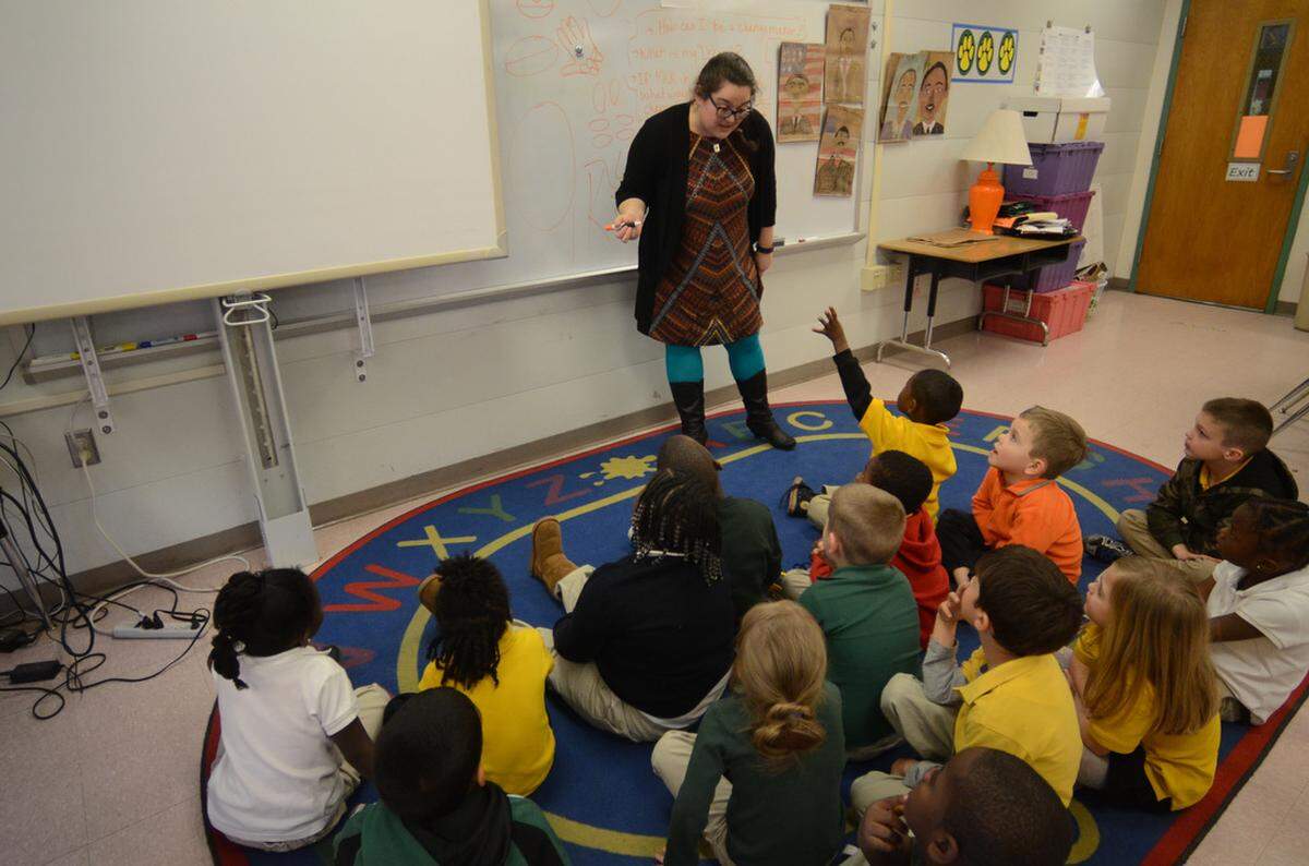 Students in Margaret Thomas’ art classes at St. Helena Elementary School were decorating grocery bags with portraits of Dr. Martin Luther King Jr. for distribution to customers on Dr. Martin Luther King Jr. Day at the nearby Publix grocery store.