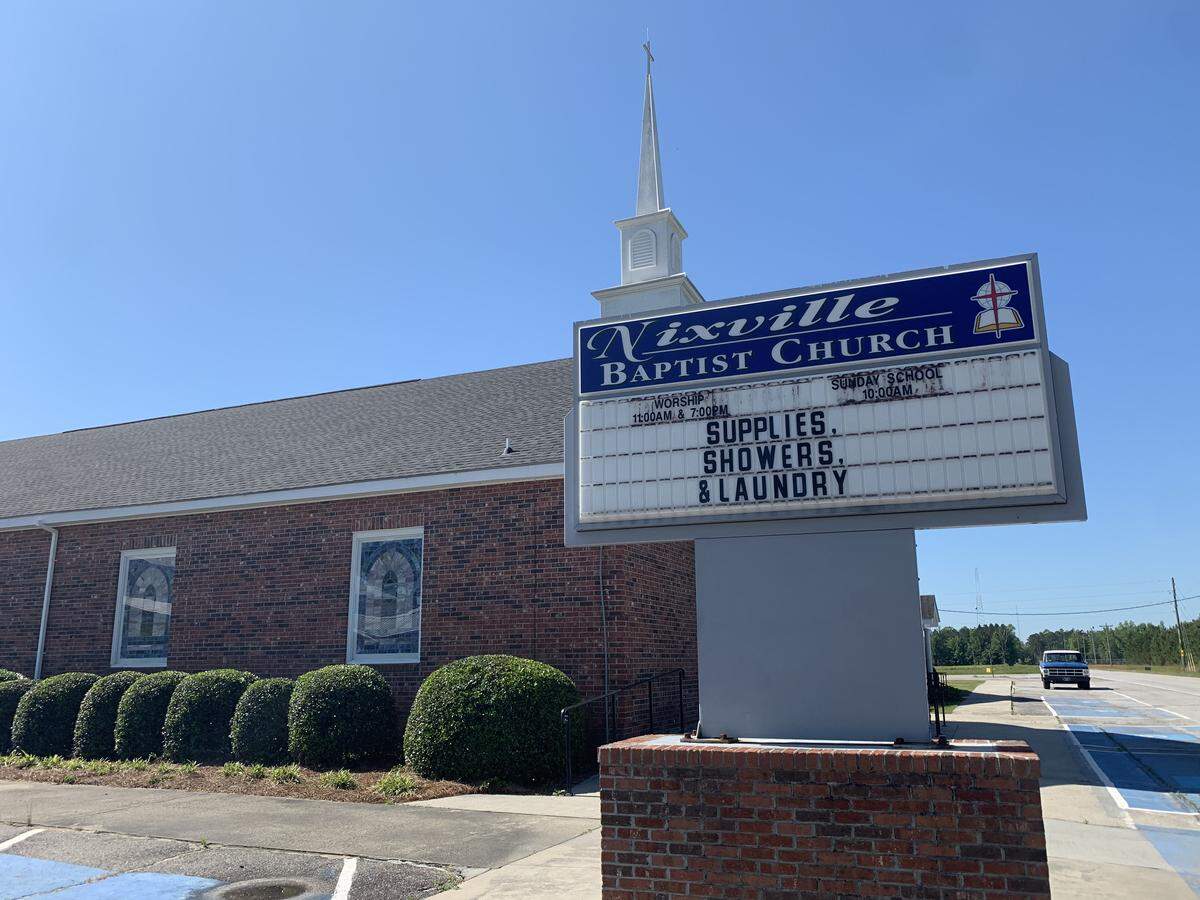 A sign outside Nixville Baptist Church in Hampton County on April 21, 2020, tells tornado survivors some resources it has to help them.