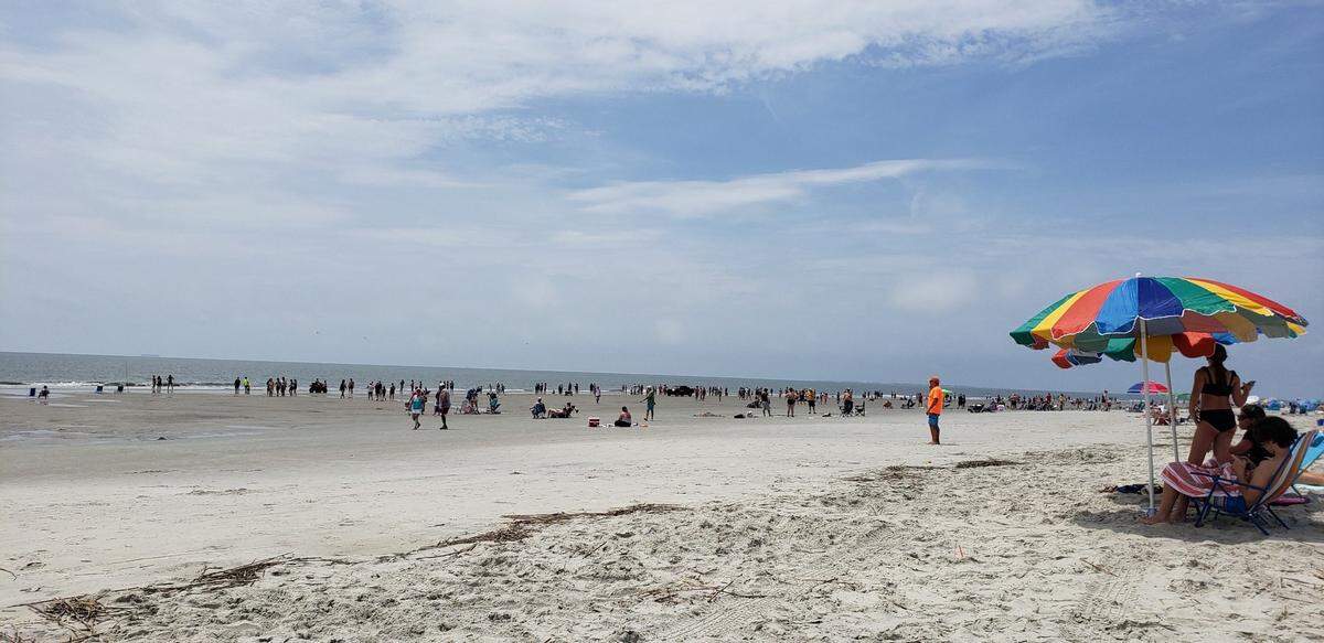 Beachgoers were ordered off Coligny Beach Monday due to a large shark spotted swimming close to shore.