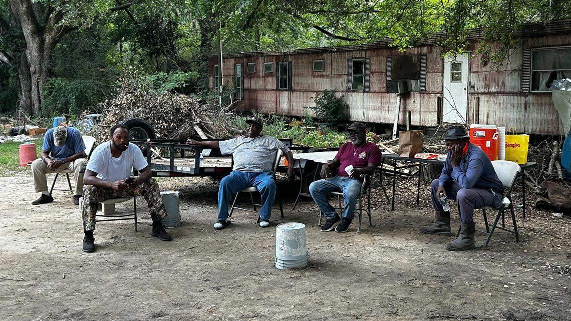 Those mourning the loss of six people who were murdered on Sunday, sat in their favorite spot and welcomed all who came to pay their respects with open arms