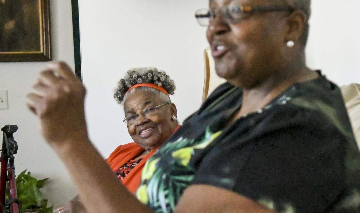 Belinda Stewart Young, 70, right, recounts counting cars traveling onto Hilton Head Island as a child on Tuesday afternoon as her mother, Margaret “Sugaree” Stewart, 92, listens as the two sit at the elder’s home along U.S. 278 located about 121 feet from the roaring traffic. Just last week, the S.C. Department of Transportation released six preliminary routes for replacing and widening the highway to the island, several of which would adversely affect the Stewart’s property.