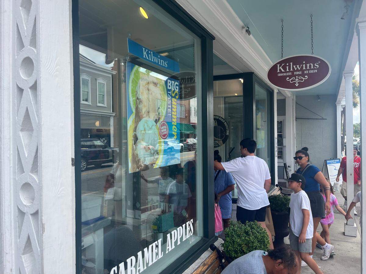 Customers enter Kilwins, a Bay Street confectionery, on Tuesday. “I’m not sure yet,” Kilwins owner David Previglian said when asked what impact the closure of the Waterfront Park promenade will have on his business.