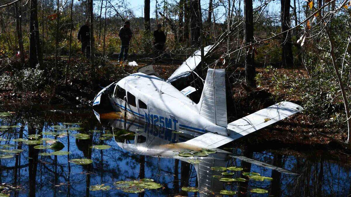 The crashed Piper Cherokee Arrow was found on the edge of a small pond in rural Colleton County, located on private property in the 5000 block of Wiggins Road.