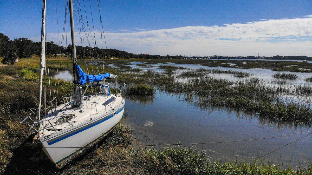 Several boats – likely from the Beaufort Marina – are currently stuck on the Beaufort River’s bank after Tropical Storm Helene moved through the area on Sept. 27 and less than two weeks later, Hurricane Milton.