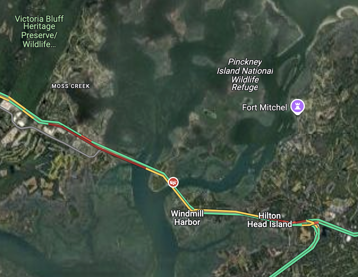 Traffic backups extended from the Tanger 1 Outlets in Bluffton to north-end Hilton Head Island after a car collision near the Windmill Harbor neighborhood around 2:50 p.m. Friday.