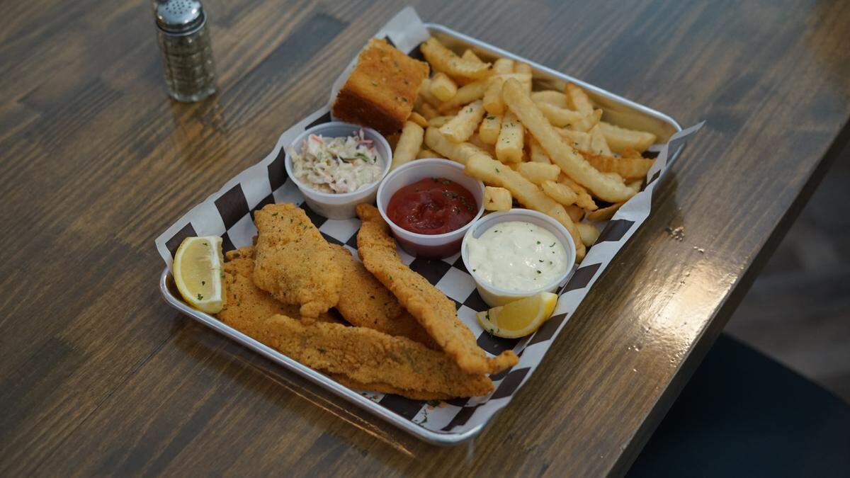 Fried catfish is served with jalapeno cornbread at River Road Cafe in Bluffton’s Sheridan Park.