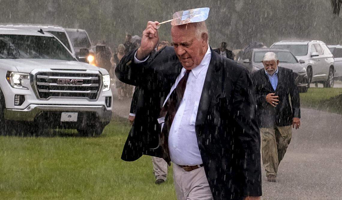 Torrential rains brought the service for Maggie Murdaugh and her son, Paul Murdaugh to an early close on Friday, June 11, 2021 at the Hampton Cemetery in Hampton. The two were murdered on June 7, 2021 outside their family’s home in Colleton County.