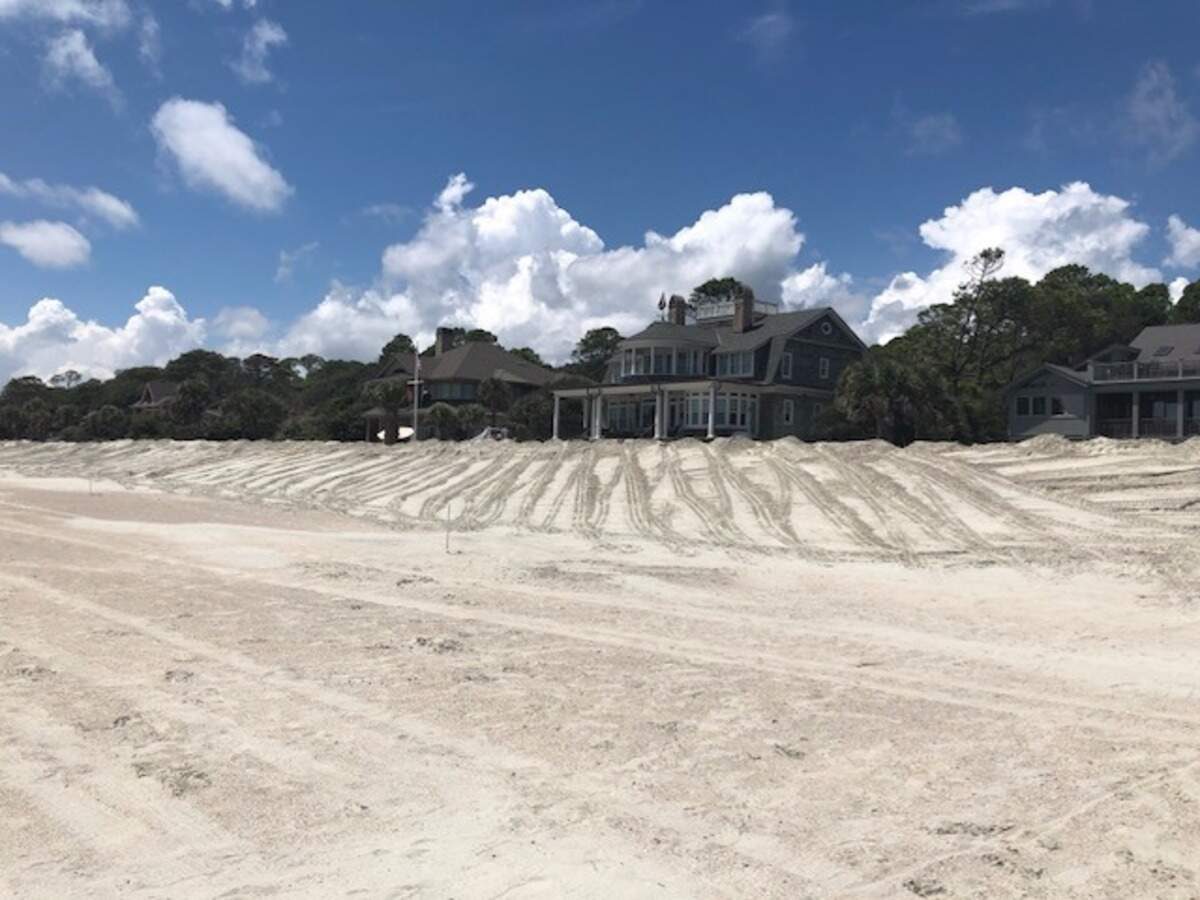 The view of the now-completed seawall outside Piping Plover Road on Hilton Head. Homeowner Bert Ellis said the wall “has now disappeared as promised.”