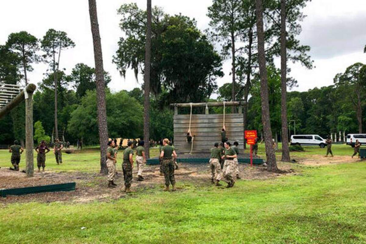 Female Marines go through one of the obstacles in the so-called confidence course at Parris Island Recruit Depot, S.C., on May 27, 2020, that is designed to make them face their fears and gain confidence. In ways big and small, the virus is impacting training at the Marine Corps’ Parris Island Recruit Depot and across the military.