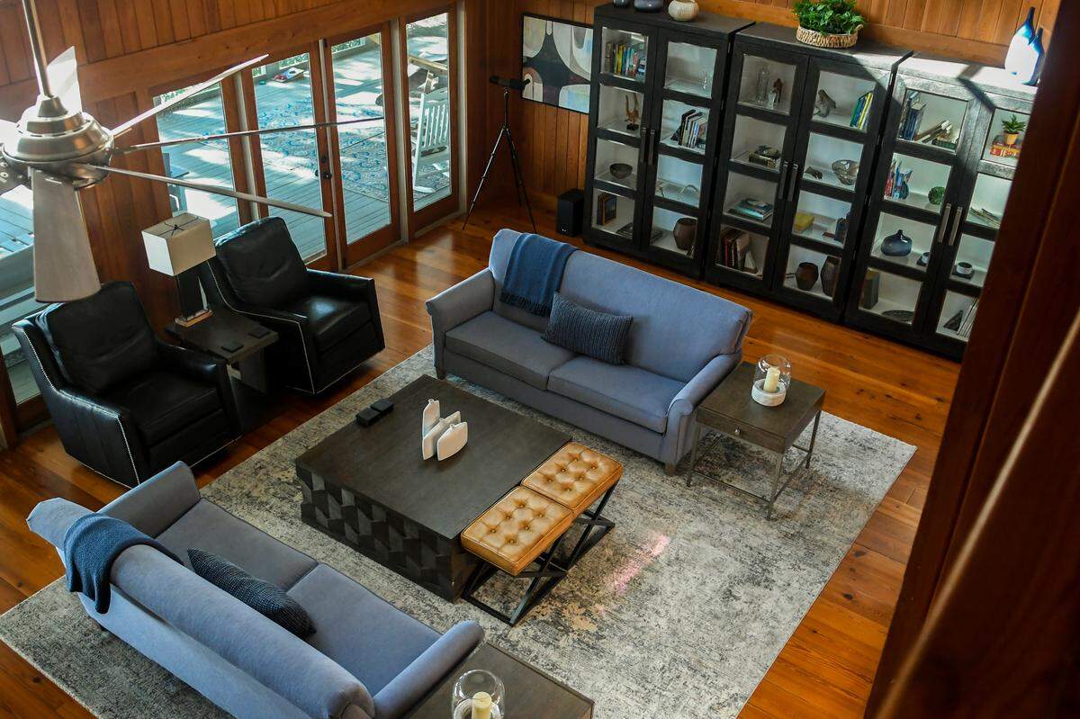 Looking down from the second floor shows the living room of Ted Turner’s former home as seen on Nov. 14, 2022, on St. Phillips Island. While the furniture is not from the estate of Turner, the home is finely furnished by the state of South Carolina and features all the comforts of home.