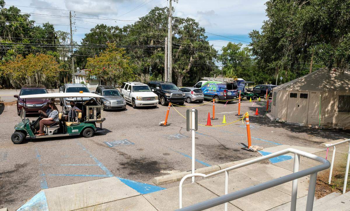 On Friday, Aug. 13, 2021, staff with the technology department at Beaufort Memorial Hospital prepare to leave the tent that was reinstalled to handle the influx of COVID-19 patients.