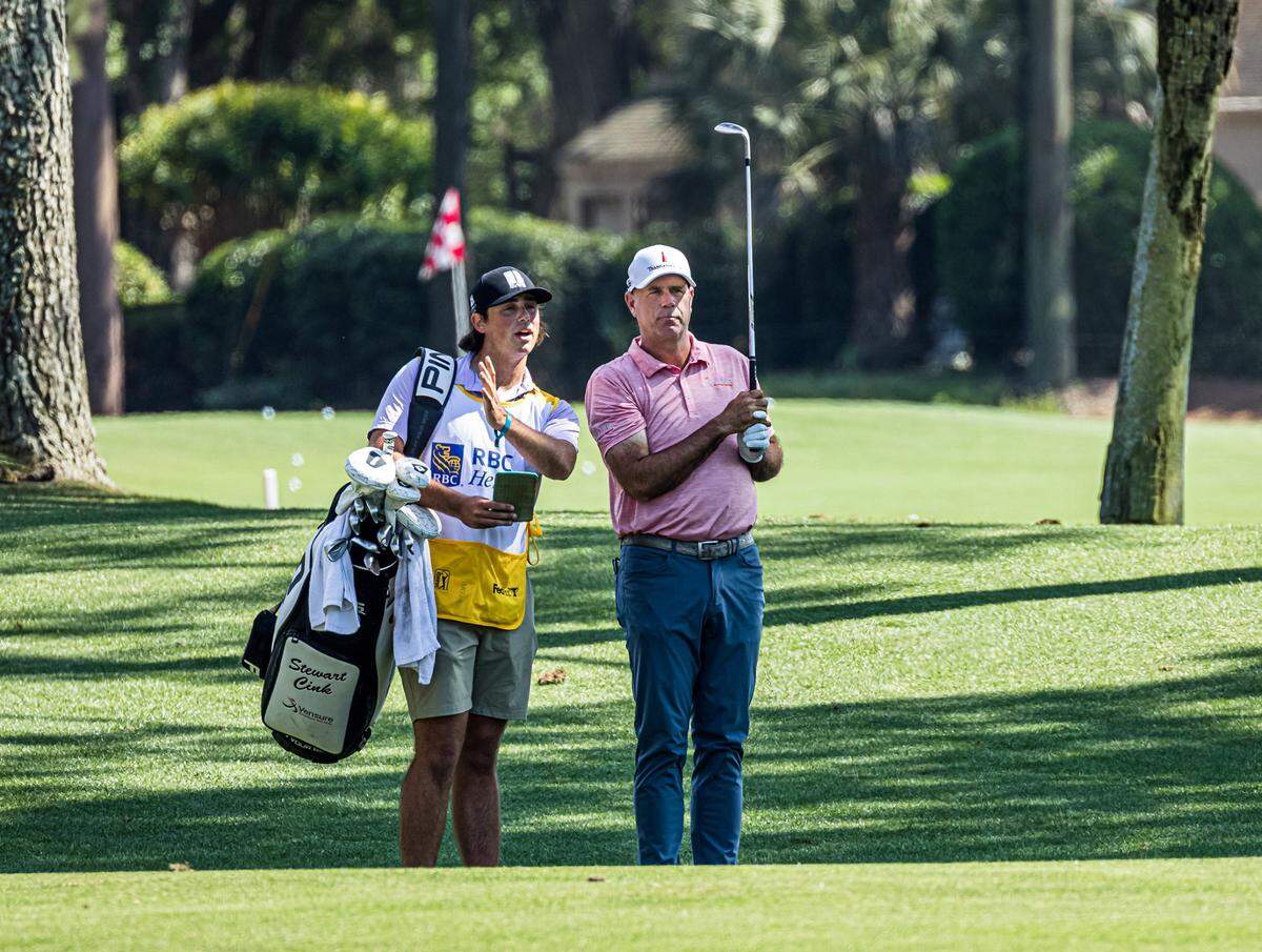 Stewart Cink and son Reagan, his caddie, at the 9th fairway during the third round of tournament play of the RBC Heritage Presented by Boeing on Saturday, April 17, 2021 at Harbour Town Golf Links in Sea Pines on Hilton Head Island.