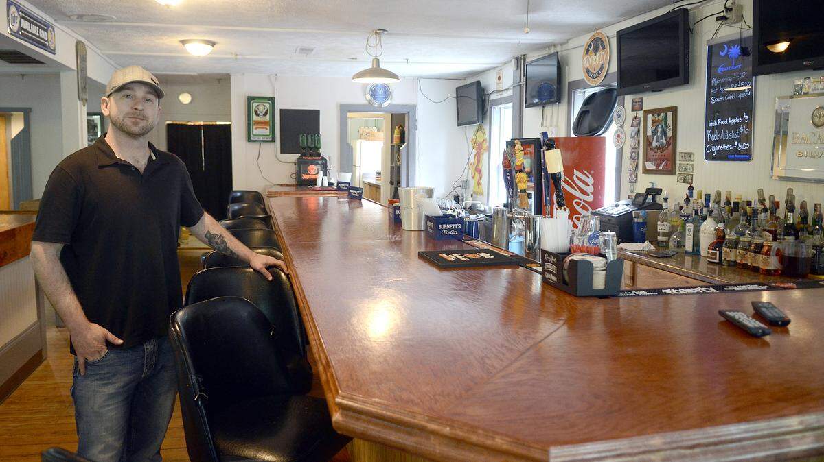 Jesse Johnson of Fripp Island, part owner of Boondocks Restaurant, stands for a portrait in the newly renovated bar at the restaurant on Friday afternoon on St. Helena Island.